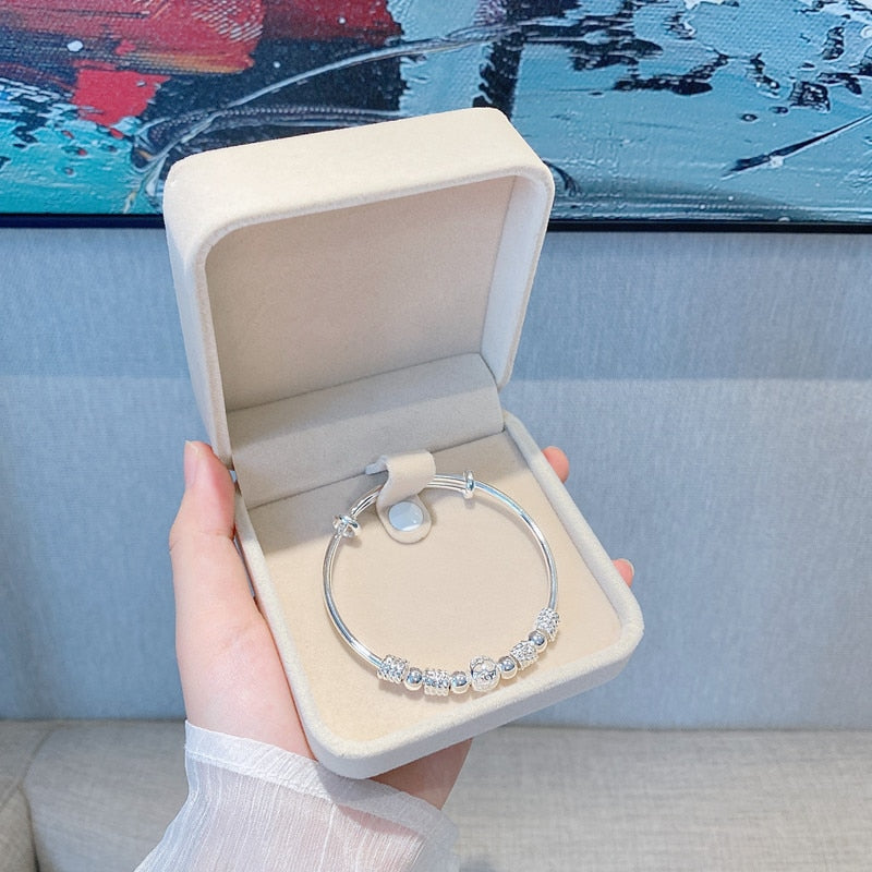 Bracelet en argent 925 perles porte-bonheur réglable
