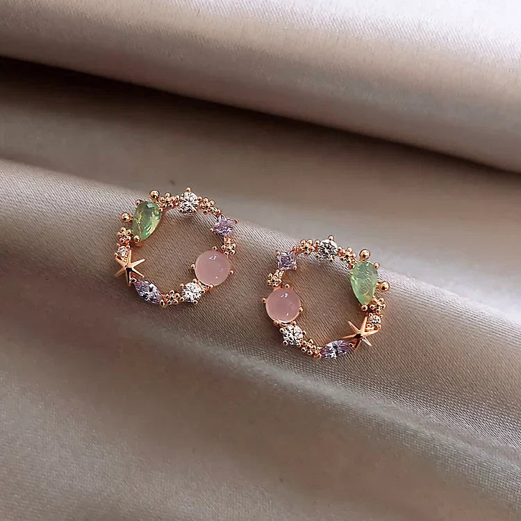 Isabella - Boucles d'oreilles fleur en zircone dorée