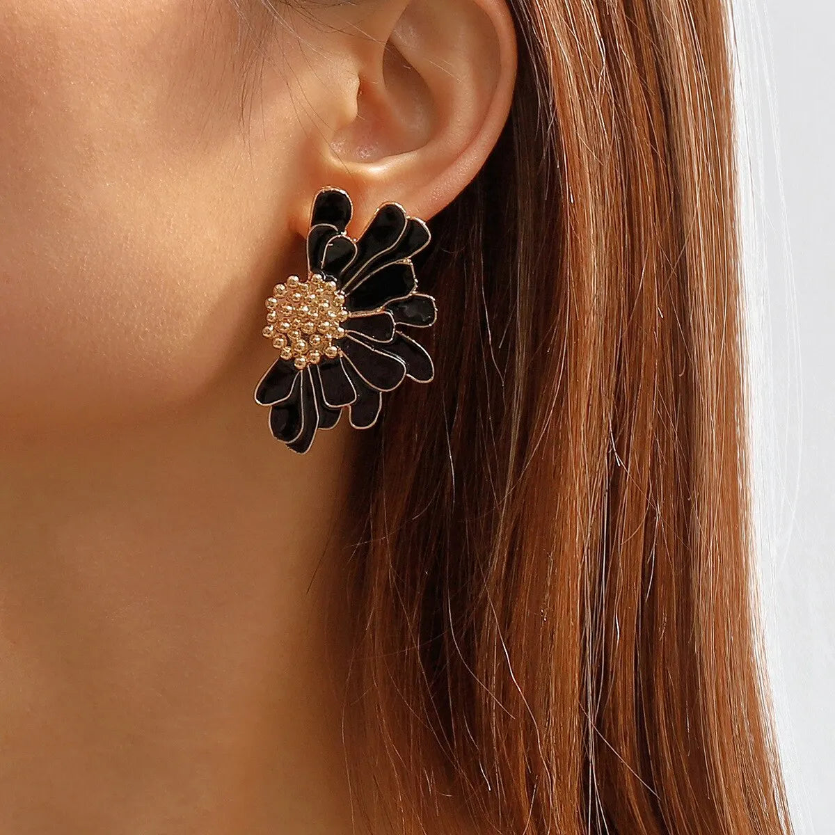 BloomGaze - Boucles d'oreilles fleurs dorées statement