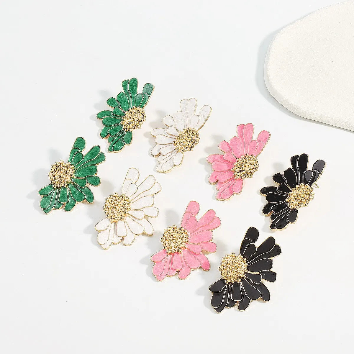 BloomGaze - Boucles d'oreilles fleurs dorées statement