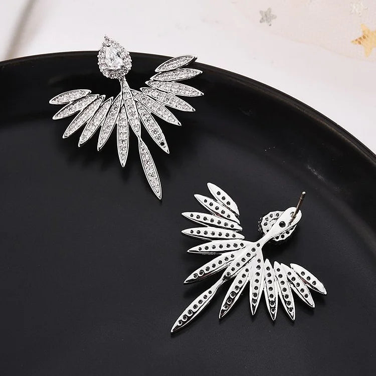 Celeste - Clous d'oreilles ailes d'ange en argent S925