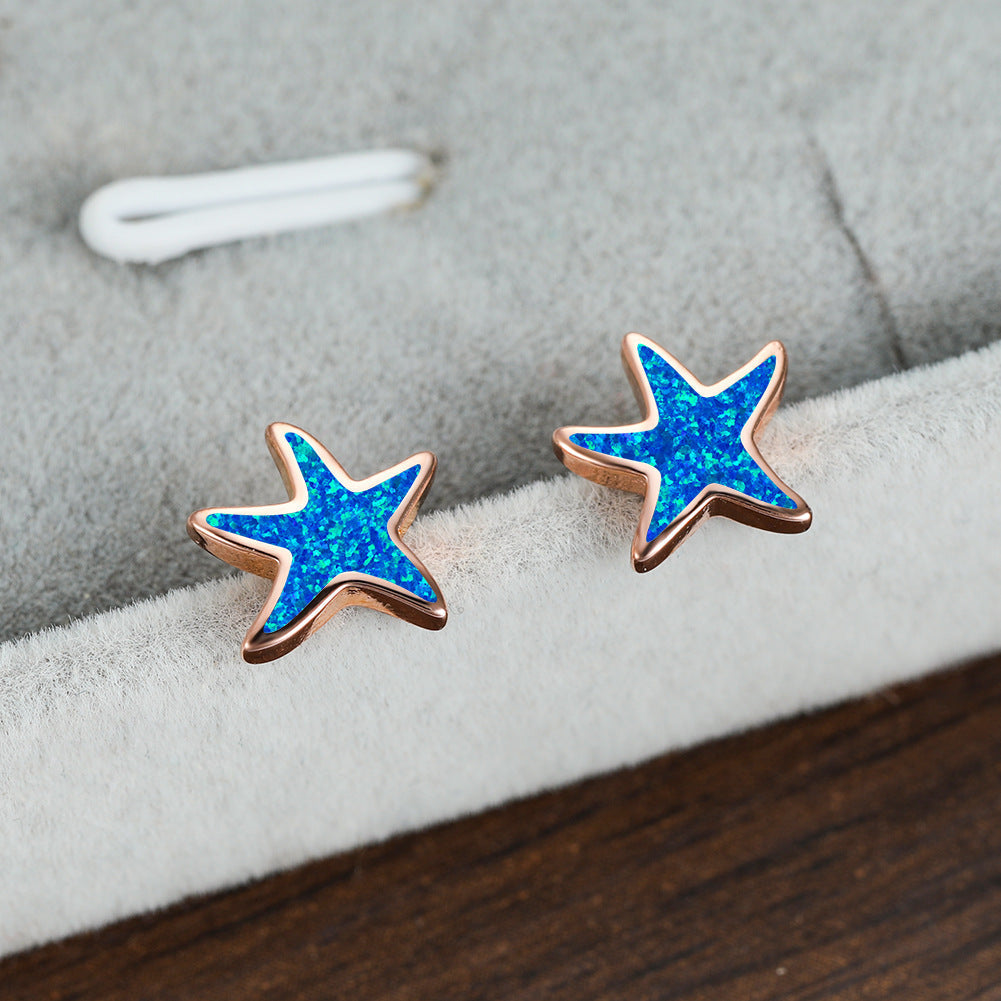 Marina - Boucles d'oreilles étoile de mer en opale bleue