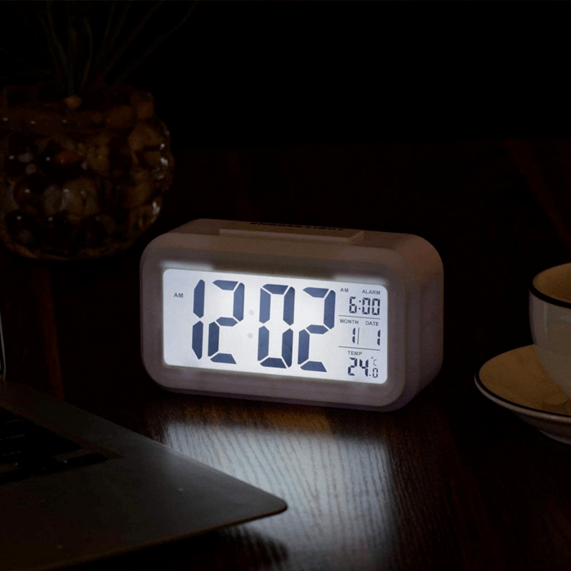 SmartAlarm Clock - Compact LCD Alarm Clock with Music Alarm and Temperature