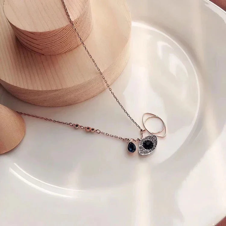Amira - Set collier et bracelet mauvais œil en or rose