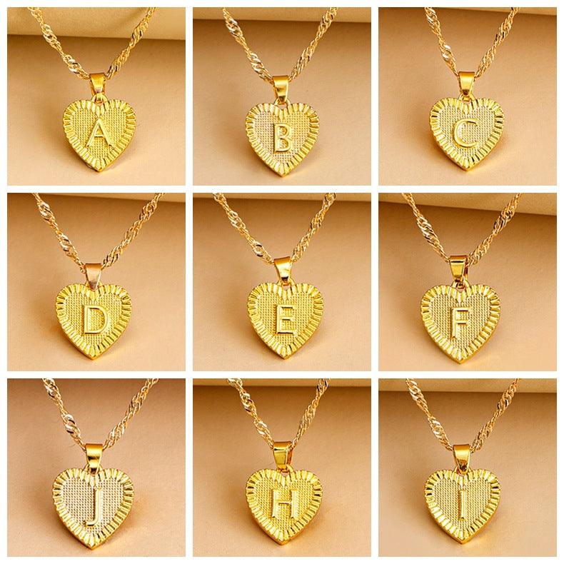 Amara - Collier cœur doré à pendentif initiale
