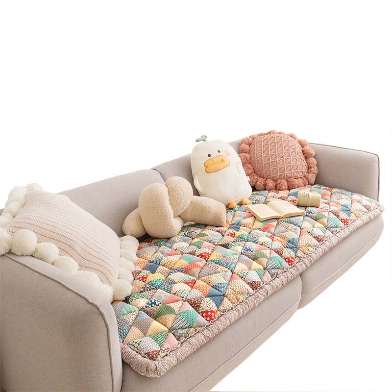 ChicShield - Quilted Sofa Cover for a Stylish Home