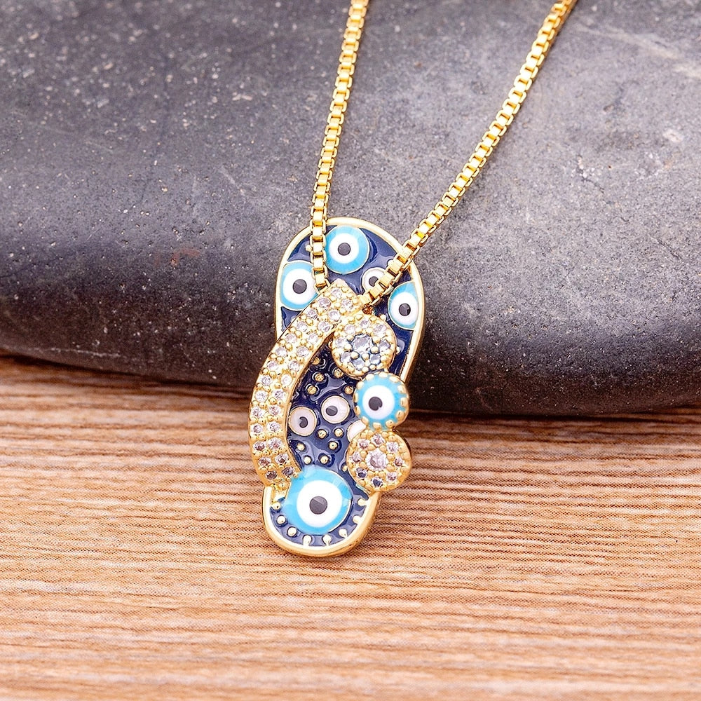Selma - Collier doré pendentif tong et mauvais œil