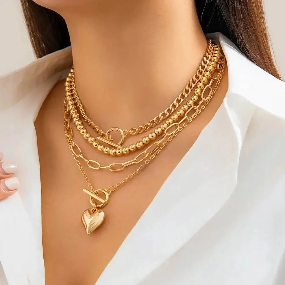 HeartGleam - Set de colliers pendentifs cœurs dorés élégants