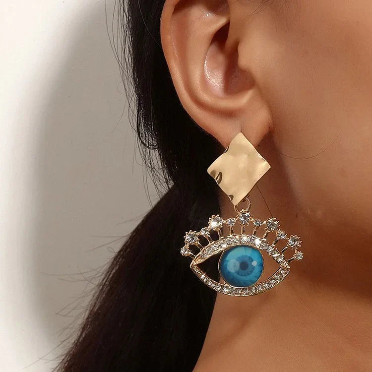 Nerina - Boucles d'oreilles vintage dorées mauvais œil