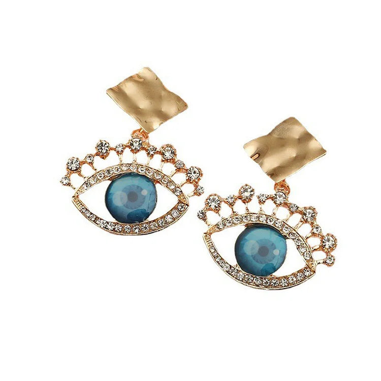 Nerina - Boucles d'oreilles vintage dorées mauvais œil